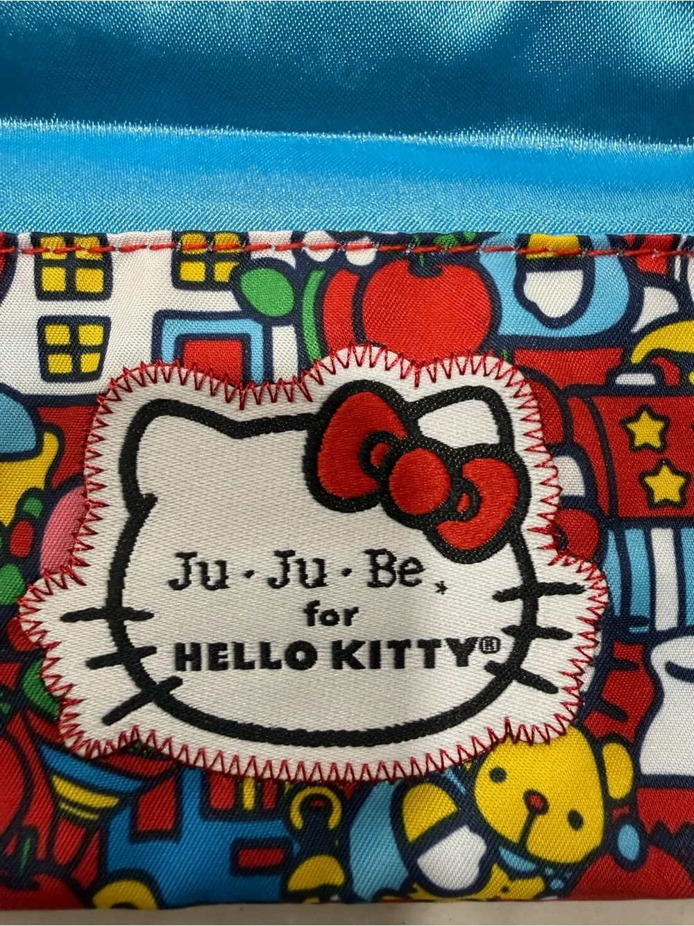 NEW Jujube X Hello Kitty Be Neat Bib